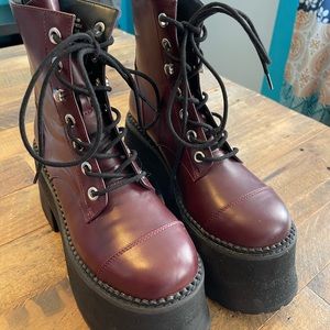 Vegan leather platform combat boots.